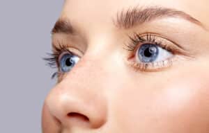 Close up of woman's eyes that look bright and refreshed from microneedling